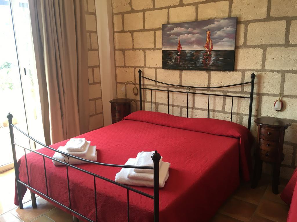 Caposperone Resort Пальми Номер фото